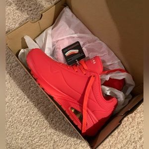 Brand new red sketcher sneakers in the box size 9